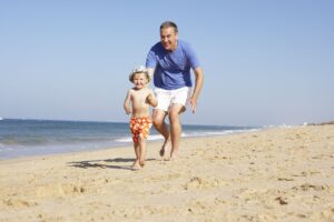 dad and child on beach